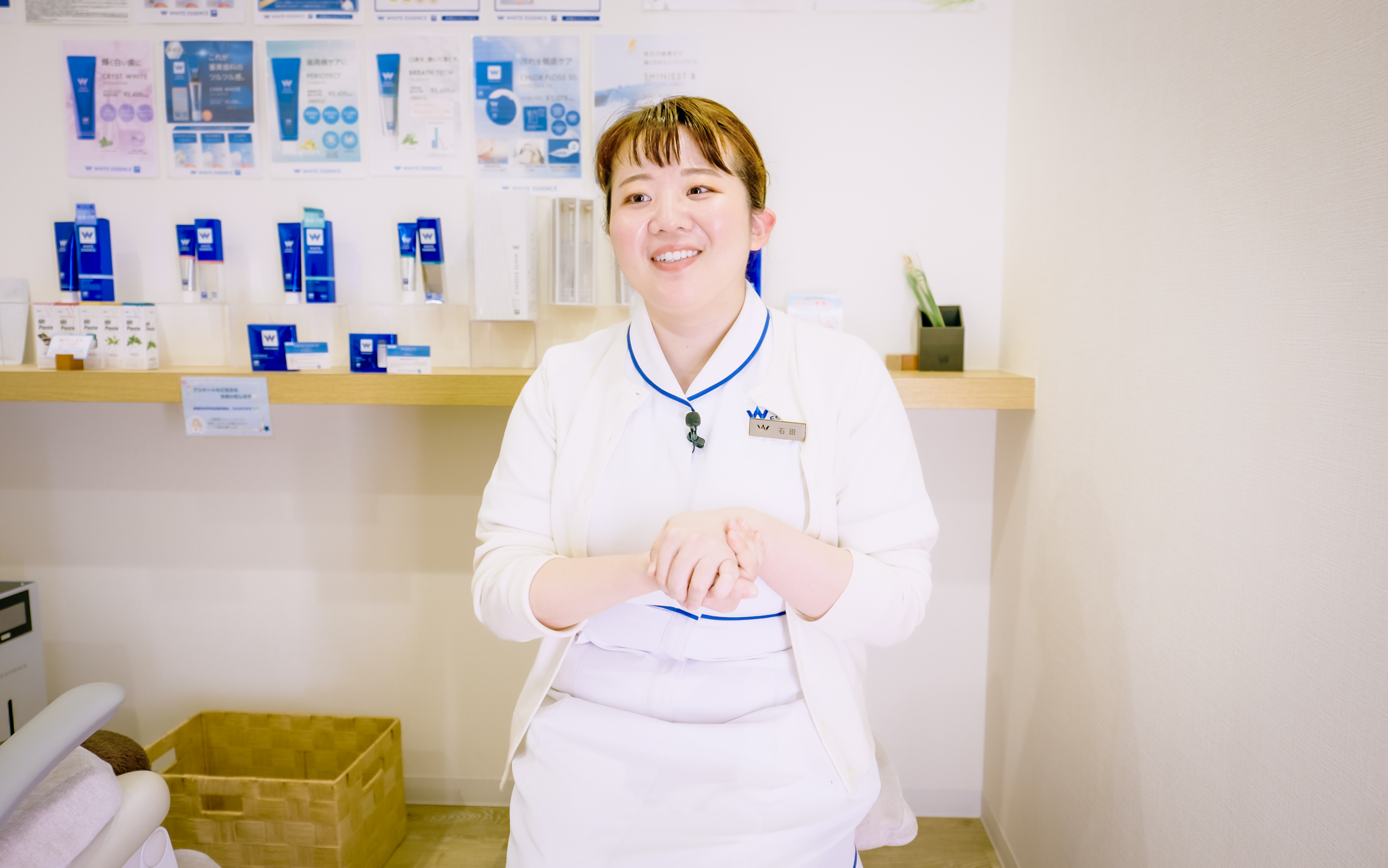 Staff member standing in front of medical products